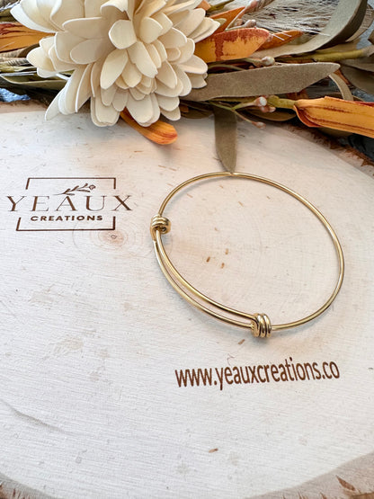 MODERN TWIST BANGLE BRACELET